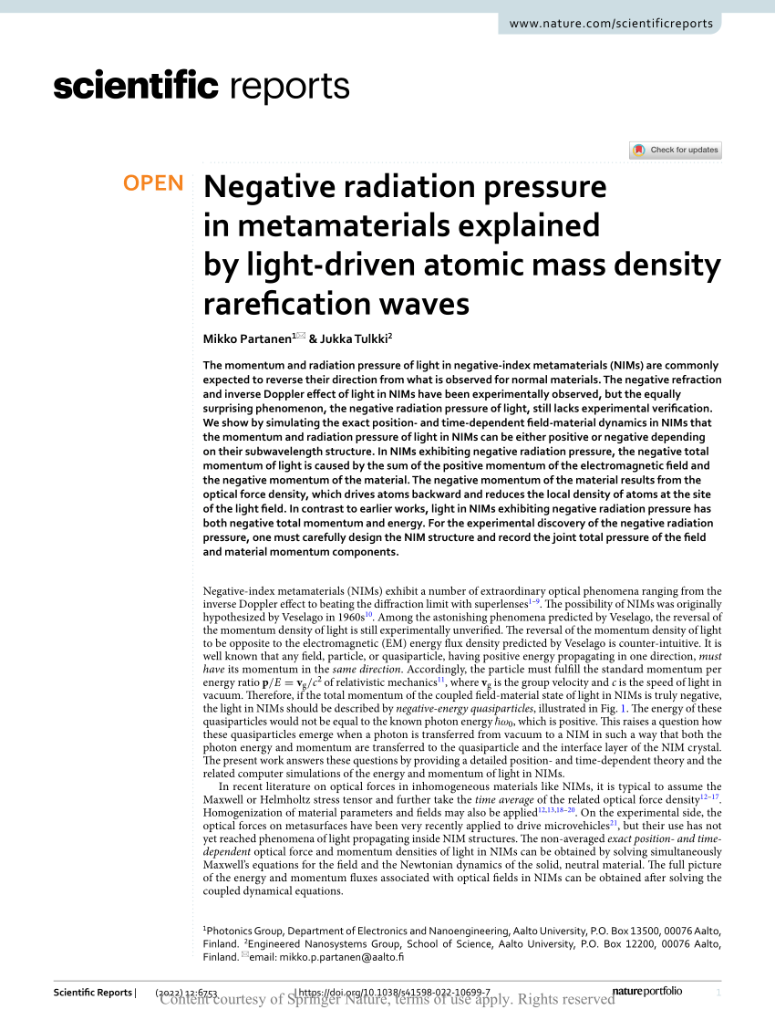 Negative radiation pressure in metamaterials explained by light-driven  atomic mass density rarefication waves